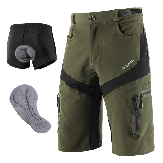 Grüne MTB-Shorts mit schwarzem Einsatz, abnehmbarer gepolsterter Innenhose und grauem Sitzpolster. Ideal für Mountainbiking und Outdoor-Aktivitäten.