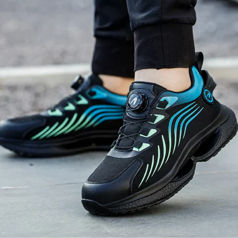 Laden Sie das Bild in Galerie -Viewer, Schwarze Sportschuhe mit blau-grünen Akzenten und innovativem Schnürsystem, getragen auf grauem Boden. Moderne Laufschuhe für Herren.
