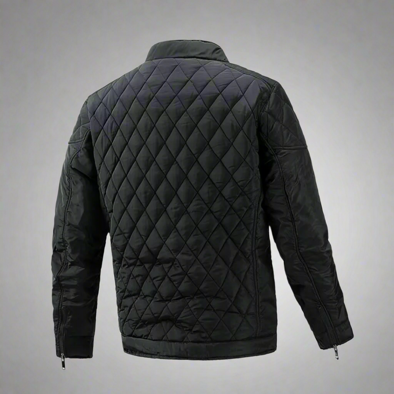 Laden Sie das Bild in Galerie -Viewer, Schwarze gesteppte Jacke, Rückansicht, mit Reißverschlüssen an den Ärmeln. Modische Winterjacke, warm und stilvoll, ideal für kalte Tage.
