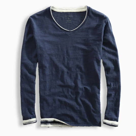 Dunkelblaues Langarmshirt mit V-Ausschnitt, weißem Kragen und Bündchen. Modisches Herrenoberteil, ideal für Freizeit und Alltag.