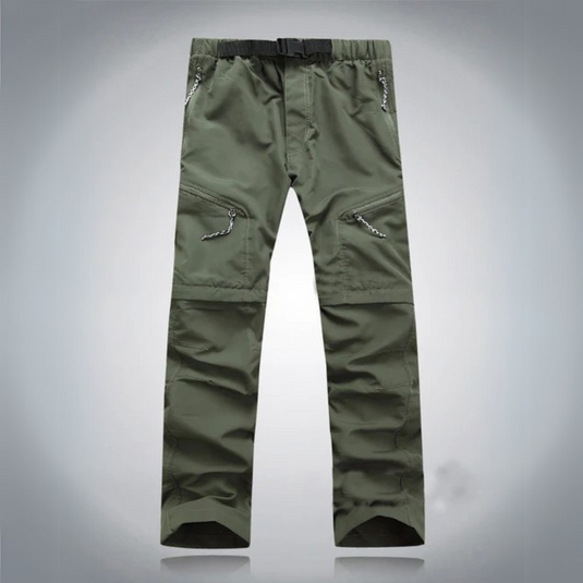 Grüne Outdoor-Hose mit Reißverschlusstaschen, verstellbarem Bund und strapazierfähigem Material. Ideal für Wandern und Trekking.