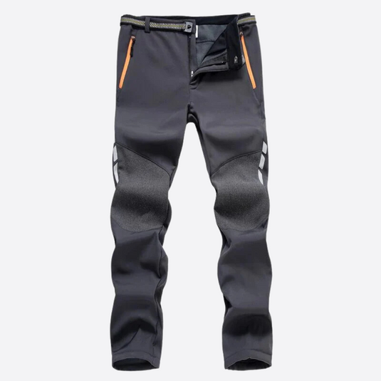 Graue Outdoor-Hose mit orangefarbenen Reißverschlüssen, verstärkten Knien und elastischem Bund. Ideal für Wandern und Trekking.