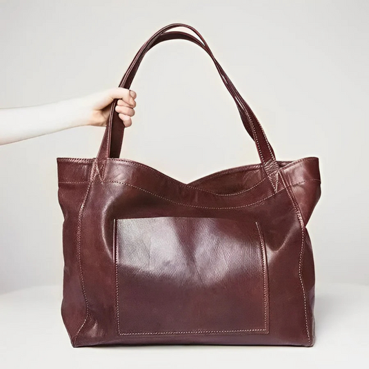 Braune Ledertasche mit großem Hauptfach und robusten Trägern, ideal für Damen. Hochwertige Handtasche aus echtem Leder, stilvoll und geräumig.