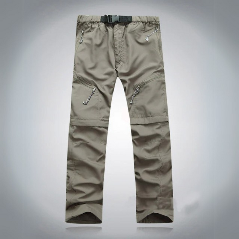 Laden Sie das Bild in Galerie -Viewer, Graue Outdoor-Hose mit Reißverschlusstaschen und Gürtel, ideal für Wandern und Trekking. Robustes Material, funktionales Design.
