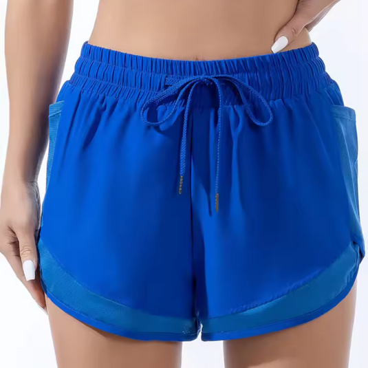 Damen blaue Sportshorts mit elastischem Bund und Kordelzug, ideal für Fitness und Laufen. Bequeme, atmungsaktive Sportbekleidung.
