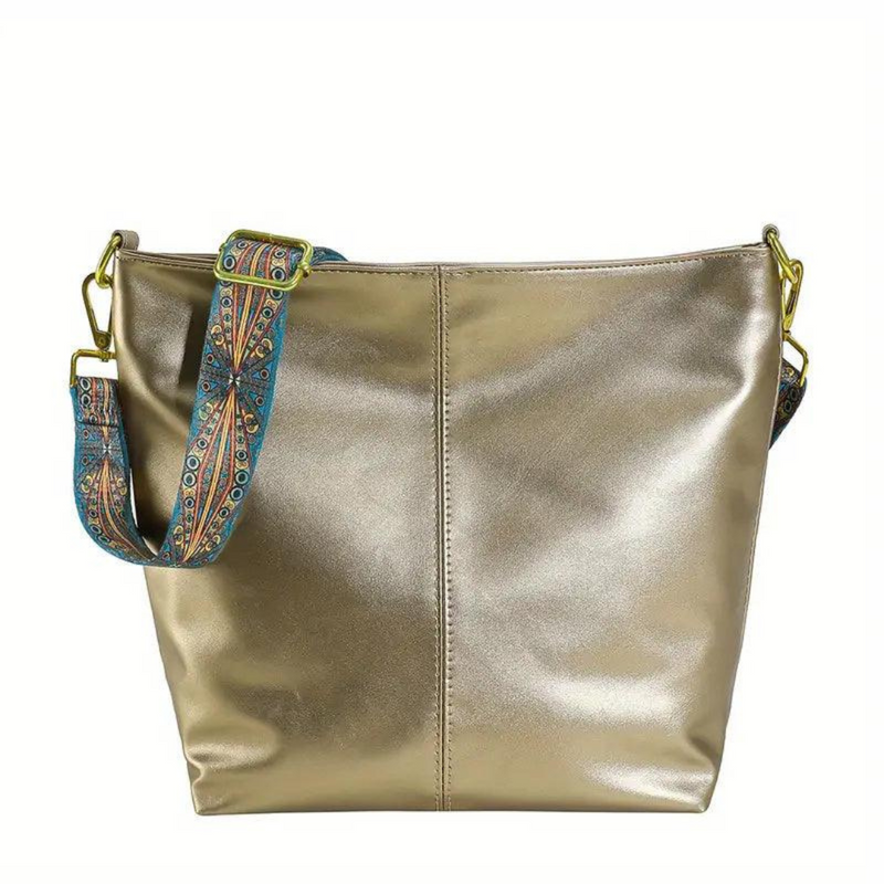 Laden Sie das Bild in Galerie -Viewer, Goldene Handtasche mit schimmerndem Finish und verziertem, buntem Schulterriemen. Modisches Accessoire für Damen, ideal für Alltag und besondere Anlässe.
