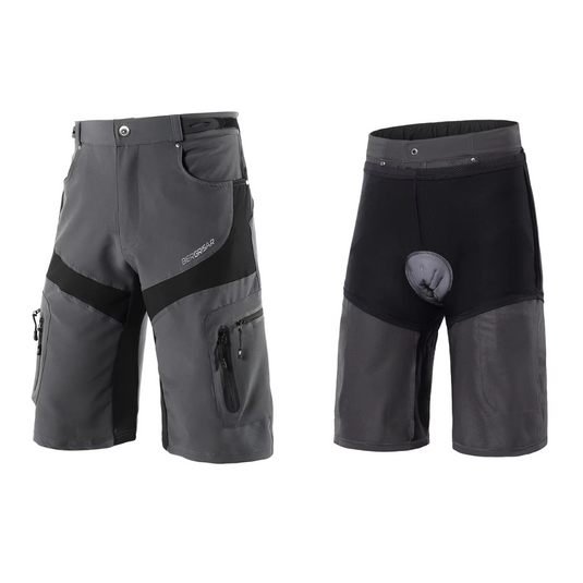 Graue Herren-Fahrradhose mit gepolstertem Innenfutter, Reißverschlusstaschen und atmungsaktivem Material. Ideal für Mountainbiking und Radsport.