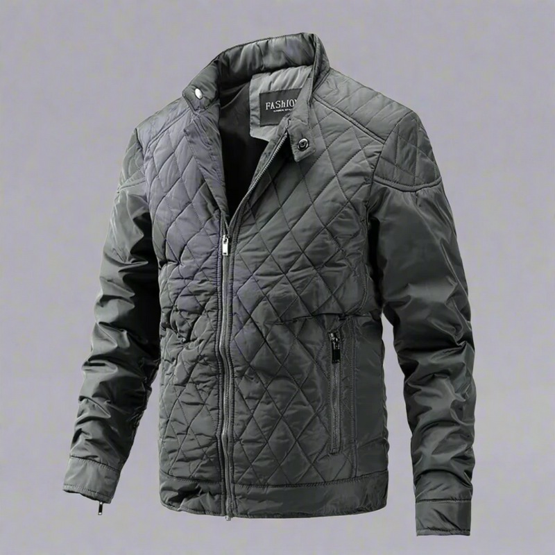 Laden Sie das Bild in Galerie -Viewer, Graue gesteppte Herrenjacke mit Reißverschluss und Stehkragen, modisches Design, ideal für Herbst und Winter.
