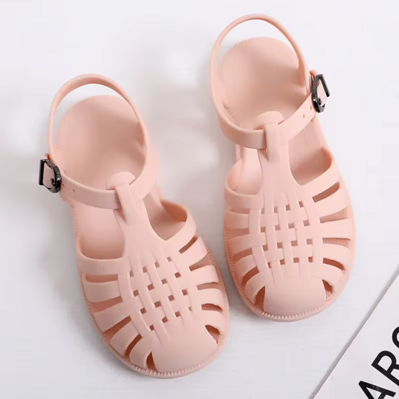 Laden Sie das Bild in Galerie -Viewer, Alt-Text: Rosa Jelly-Sandalen aus Kunststoff mit Schnalle, ideal für Sommermode und Strand. Leicht, bequem und stilvoll für Damen.
