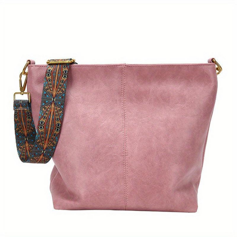 Laden Sie das Bild in Galerie -Viewer, Rosa Damenhandtasche aus Leder mit verziertem, abnehmbarem Schulterriemen. Modische Umhängetasche, ideal für Alltag und Freizeit.
