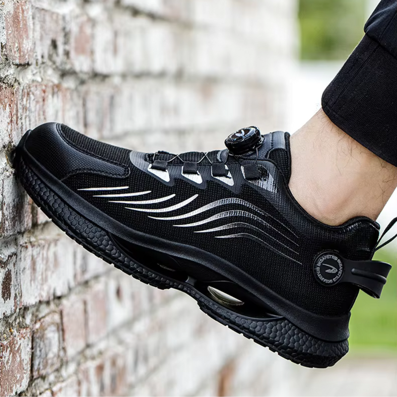 Laden Sie das Bild in Galerie -Viewer, Schwarzer Sportschuh mit modernem Design, atmungsaktivem Mesh-Obermaterial und rutschfester Sohle, ideal für Laufen und Fitness.
